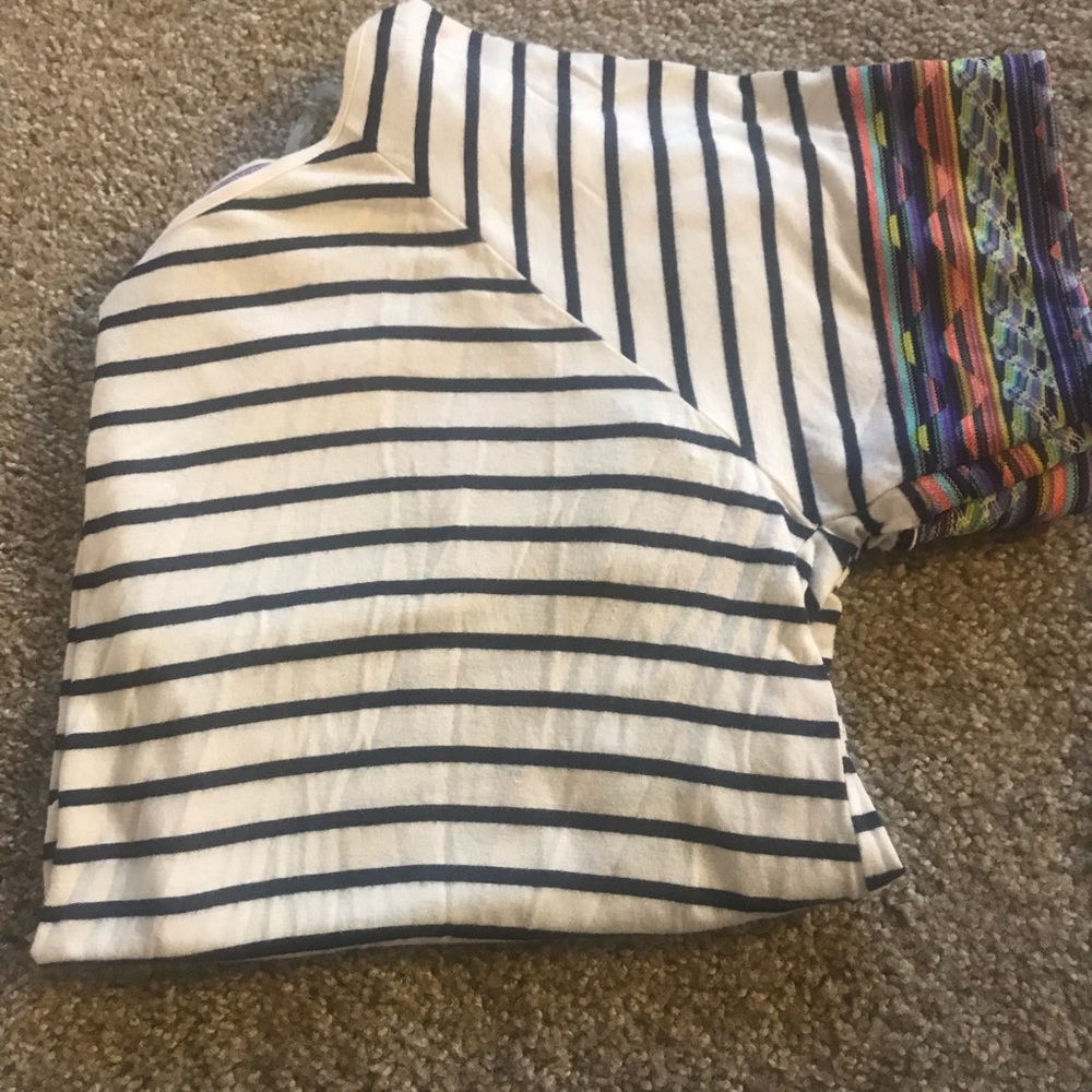 Striped tee with tribal print details!